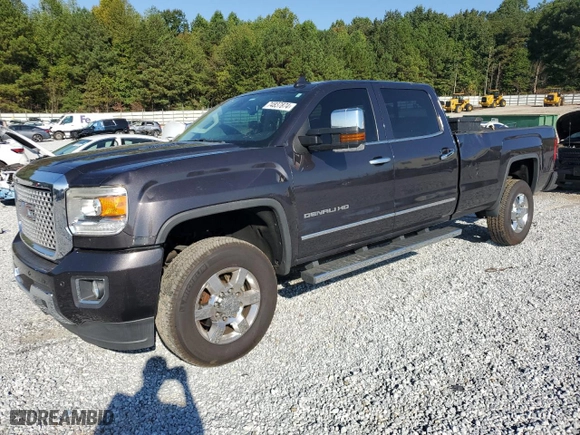 2015 GMC Sierra 3500HD Denali with VIN 1GT424E86FF533171, listed as a Copart auction lot 74837874 with 128,234 mi miles and Salvage Title. Bid and sale history available at carsss.com. Image 1.