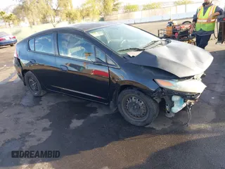 2010 Honda Insight LX with VIN JHMZE2H59AS006887, listed as a IAAI auction lot 41159288 with 263,497 mi miles and . Bid and sale history available at DreamBid. Image 1.