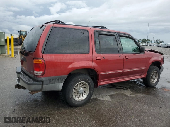2000 Ford Explorer XLT z VIN 1FMZU73E3YUB16272, wystawiony jako Copart lot #59479125 z przebiegiem 146 722 mil mil oraz Szkoda całkowita • Salvage title. Historia ofert i sprzedaży dostępna na DreamBid. Obrazek 3.