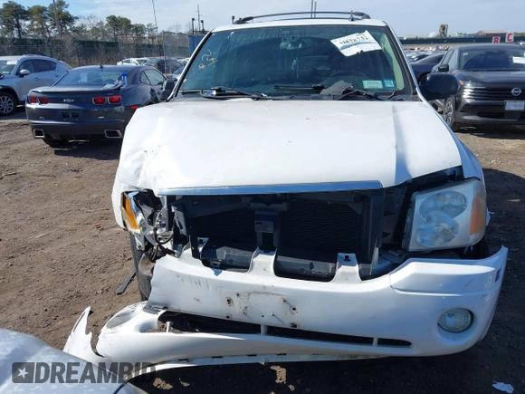 2006 GMC Envoy SLE with VIN 1GKDT13S662355509, listed as a IAAI auction lot 41628732 with 187,635 mi miles. Bid and sale history available at carsss.com. Image 6.