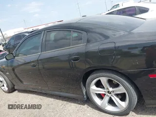 2012 Dodge Charger SRT8 with VIN 2C3CDXEJ7CH169853, listed as a IAAI auction lot 41857468 with 145,016 mi miles. Bid and sale history available at carsss.com. Image 13.