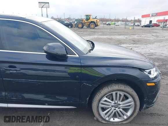 2018 Audi Q5 Premium Plus z VIN WA1BNAFYXJ2092411, wystawiony jako IAAI lot #41051336 z przebiegiem 54 595 mil mil oraz . Historia ofert i sprzedaży dostępna na DreamBid. Obrazek 18.