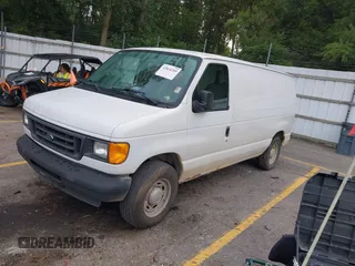 2006 Ford Econoline Cargo with VIN 1FTRE14W26HA13663, listed as a IAAI auction lot 42844289 with 153,510 mi miles and . Bid and sale history available at DreamBid. Image 2.
