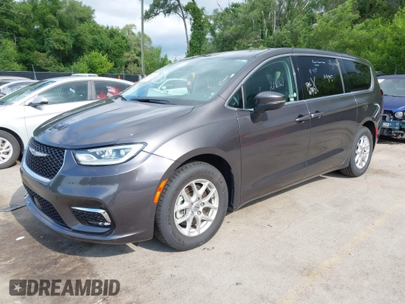 2023 Chrysler Pacifica Touring L with VIN 2C4RC1BG6PR612749, listed as a IAAI auction lot 42612932 with 69,931 mi miles and . Bid and sale history available at DreamBid. Image 18.