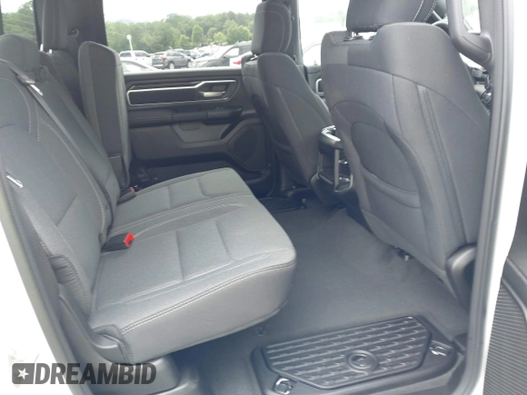 2023 Ram 1500 Big Horn with VIN 1C6SRFFT7PN704929, listed as a IAAI auction lot 42534420 with 2,560 mi miles and . Bid and sale history available at DreamBid. Image 8.