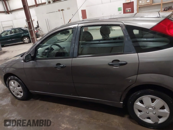 2007 Ford Focus S with VIN 1FAFP37N87W333049, listed as a IAAI auction lot 41450683 with 307,869 mi miles and . Bid and sale history available at carsss.com. Image 14.