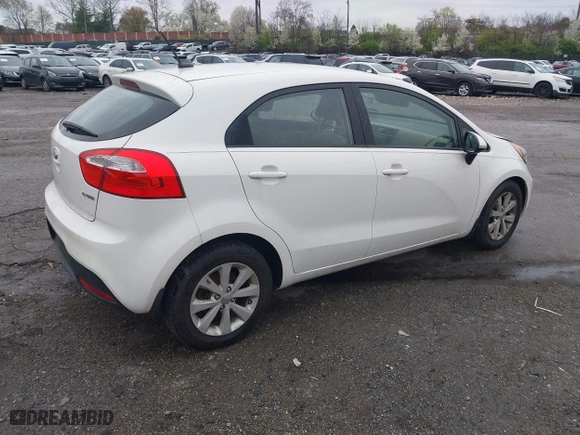 2013 Kia Rio SX with VIN KNADN5A34D6245263, listed as a IAAI auction lot 41976166 with 101,438 mi miles. Bid and sale history available at carsss.com. Image 4.