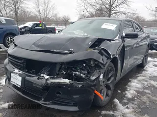 2022 Dodge Charger SXT with VIN 2C3CDXBG0NH157720, listed as a IAAI auction lot 41559731 with 21,062 mi miles and . Bid and sale history available at carsss.com. Image 2.
