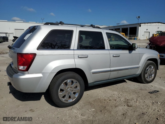 2009 Jeep Grand Cherokee Limited with VIN 1J8HS58P69C521028, listed as a Copart auction lot 77109564 with 147,700 mi miles and Clean Title. Bid and sale history available at carsss.com. Image 3.