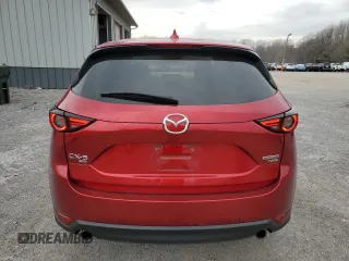2021 Mazda CX-5 Grand Touring Reserve with VIN JM3KFBAY3M0315640, listed as a Copart auction lot 51004955 with 21,981 mi miles and Salvage Title. Bid and sale history available at DreamBid. Image 6.