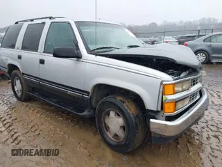 1997 Chevrolet Tahoe z VIN 1GNEK13R0VJ351919, wystawiony jako IAAI lot #41028840 z przebiegiem 218 937 mil mil oraz . Historia ofert i sprzedaży dostępna na DreamBid. Obrazek 1.