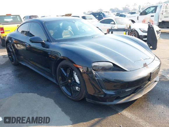 2022 Porsche Taycan z VIN WP0AA2Y10NSA11640, wystawiony jako IAAI lot #41215410 z przebiegiem 25 749 mil mil oraz . Historia ofert i sprzedaży dostępna na DreamBid. Obrazek 1.
