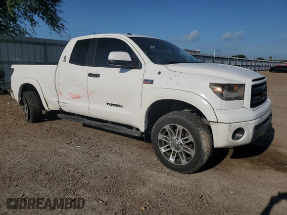 2012 Toyota Tundra 4WD Truck with VIN 5TFUW5F11CX225553, listed as a Copart auction lot 66095434 with 73,815 mi miles and Salvage Title. Bid and sale history available at carsss.com. Image 4.