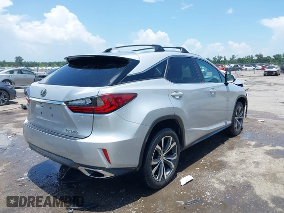 2017 Lexus RX 350 with VIN 2T2ZZMCA9HC070456, listed as a IAAI auction lot 42661016 with 82,625 mi miles and . Bid and sale history available at DreamBid. Image 4.