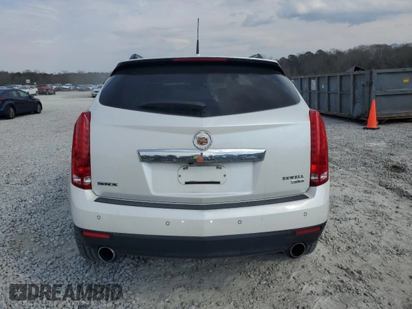 2013 Cadillac SRX Premium Collection with VIN 3GYFNEE33DS655323, listed as a Copart auction lot 47194335 with 79,612 mi miles and Salvage title. Bid and sale history available at DreamBid. Image 6.