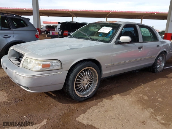2006 Mercury Grand Marquis GS with VIN 2MEFM74VX6X638763, listed as a IAAI auction lot 41735612 with 123,914 mi miles. Bid and sale history available at carsss.com. Image 2.