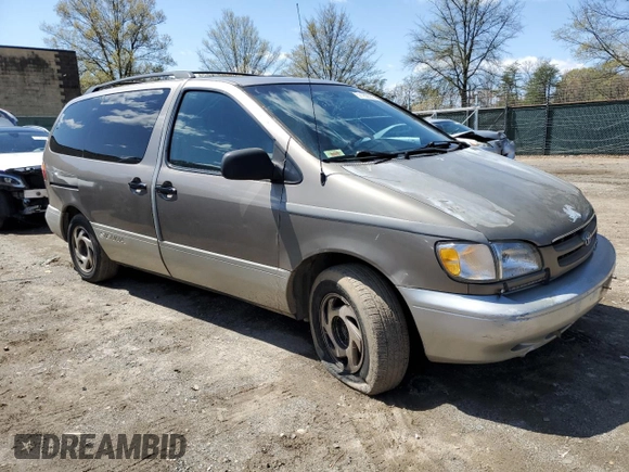 1999 Toyota Sienna LE with VIN 4T3ZF13C2XU112113, listed as a Copart auction lot 52162655 with 248,091 mi miles and Salvage Title. Bid and sale history available at carsss.com. Image 4.