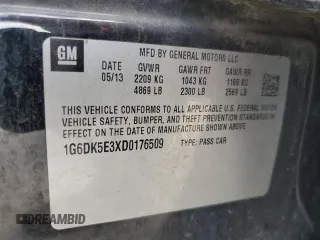 2013 Cadillac CTS Performance with VIN 1G6DK5E3XD0176509, listed as a Copart auction lot 79351754 with 108,548 mi miles and Salvage Title. Bid and sale history available at DreamBid. Image 12.