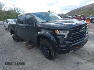 2023 Chevrolet Silverado 1500 LT Trail Boss with VIN 3GCUDFE89PG270678, listed as a IAAI auction lot 42028188 with 46,820 mi miles and . Bid and sale history available at DreamBid. Image 1.