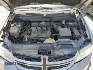 2017 Dodge Journey SXT z VIN 3C4PDDBG1HT578238, wystawiony jako Copart lot #61497045 z przebiegiem 132 179 mil mil oraz Szkoda całkowita • Salvage title. Historia ofert i sprzedaży dostępna na DreamBid. Obrazek 12.