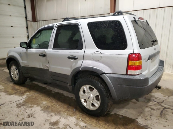 2002 Ford Escape Limited with VIN 1FMCU04122KD98349, listed as a Copart auction lot 82210654 with 129,933 mi miles and Salvage Title. Bid and sale history available at carsss.com. Image 2.