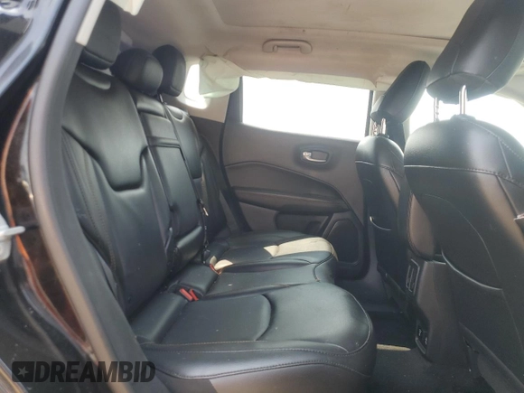2019 Jeep Compass Limited z VIN 3C4NJDCB0KT647592, wystawiony jako Copart lot #64810305 z przebiegiem 68 518 mil mil oraz Czysty tytuł • Clean title. Historia ofert i sprzedaży dostępna na DreamBid. Obrazek 10.