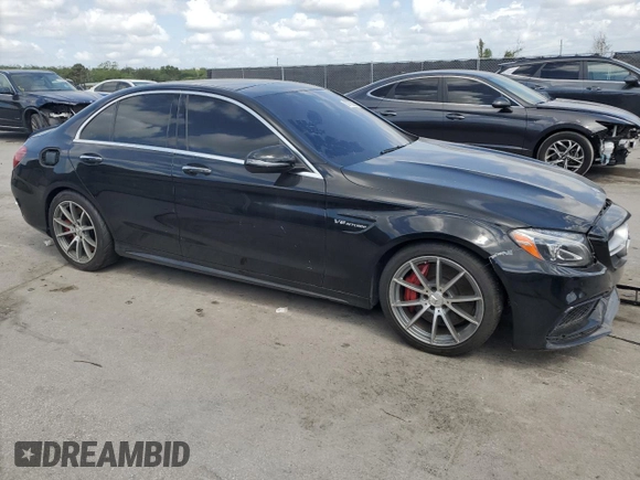 2016 Mercedes-Benz C 63 AMG with VIN 55SWF8GB0GU115383, listed as a Copart auction lot 52738005 with 101,439 mi miles and Clean title. Bid and sale history available at DreamBid. Image 4.