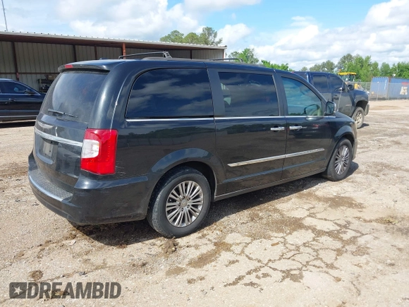 2015 Chrysler Town & Country Touring L with VIN 2C4RC1CG4FR509973, listed as a IAAI auction lot 42121743 with 199,183 mi miles and . Bid and sale history available at carsss.com. Image 4.
