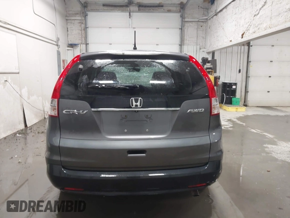 2013 Honda CR-V EX with VIN 2HKRM4H59DH682484, listed as a IAAI auction lot 41504589 with 208,260 mi miles and . Bid and sale history available at DreamBid. Image 16.