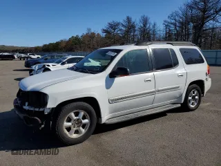 2003 GMC Envoy SLT z VIN 1GKET16S736179347, wystawiony jako Copart lot #52370775 z przebiegiem 230 623 mil mil oraz Szkody całkowita. Historia ofert i sprzedaży dostępna na DreamBid. Obrazek 1.