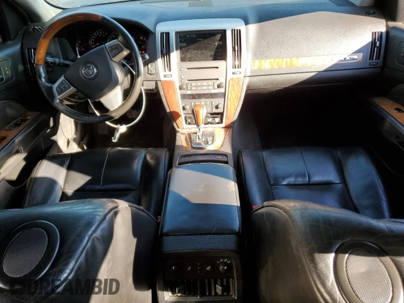 2009 Cadillac STS AWD with VIN 1G6DD67VX90137540, listed as a Copart auction lot 42062184 with 153,969 mi miles and Clean Title. Bid and sale history available at DreamBid. Image 8.