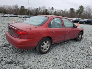 2000 Ford Contour z VIN 3FAFP6635YM116450, wystawiony jako Copart lot #44007405 z przebiegiem 361 094 mil mil oraz Szkoda całkowita • Salvage title. Historia ofert i sprzedaży dostępna na DreamBid. Obrazek 3.