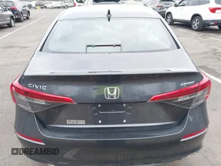 2022 Honda Civic Sport z VIN 2HGFE2F5XNH603892, wystawiony jako IAAI lot #41747318 z przebiegiem 30 679 mil mil oraz . Historia ofert i sprzedaży dostępna na DreamBid. Obrazek 16.