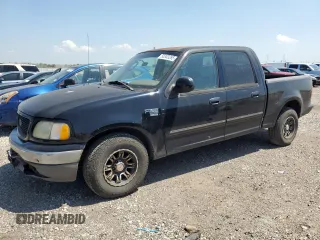 2003 Ford F-150 XLT with VIN 1FTRW07623KD82847, listed as a Copart auction lot 50303265 with 156,781 mi miles and Clean Title. Bid and sale history available at carsss.com. Image 1.