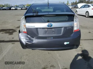 2013 Toyota Prius z VIN JTDKN3DP6D3033253, wystawiony jako Copart lot #53166025 z przebiegiem 169 319 mil mil oraz Nie do naprawy • Non repairable. Historia ofert i sprzedaży dostępna na DreamBid. Obrazek 6.