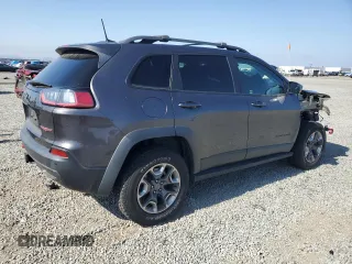 2019 Jeep Cherokee Trailhawk Elite z VIN 1C4PJMBN0KD427007, wystawiony jako Copart lot #57429735 z przebiegiem 54 070 mil mil oraz Szkoda całkowita • Salvage title. Historia ofert i sprzedaży dostępna na DreamBid. Obrazek 3.
