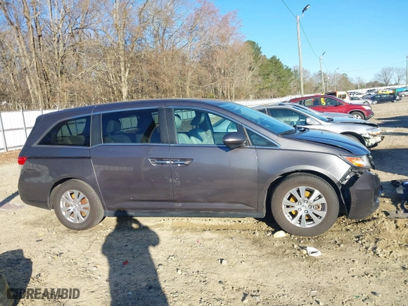 2016 Honda Odyssey SE with VIN 5FNRL5H36GB124005, listed as a IAAI auction lot 41813215 with 149,697 mi miles. Bid and sale history available at carsss.com. Image 13.