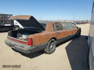 1997 Lincoln Town Car Executive with VIN 1LNLM81W0VY678786, listed as a Copart auction lot 64906284 with 0 mi miles and Salvage Title. Bid and sale history available at carsss.com. Image 3.