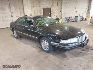 1997 Cadillac Seville Luxury SLS with VIN 1G6KS52YXVU816736, listed as a IAAI auction lot 41854220 with 107,091 mi miles. Bid and sale history available at carsss.com. Image 1.