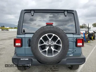 2024 Jeep Wrangler Sport S with VIN 1C4PJXDN4RW124924, listed as a Copart auction lot 50516555 with 7,747 mi miles and Salvage Title. Bid and sale history available at DreamBid. Image 6.