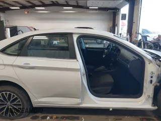 2021 Volkswagen Jetta S z VIN 3VWC57BU5MM046236, wystawiony jako IAAI lot #41740297 z przebiegiem 57 769 mil mil oraz . Historia ofert i sprzedaży dostępna na DreamBid. Obrazek 14.