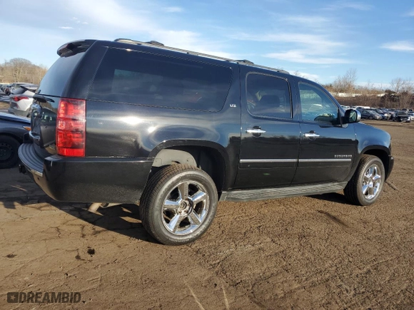 2011 Chevrolet Suburban LTZ with VIN 1GNSKKE33BR187175, listed as a Copart auction lot 47043715 with NaN miles and Salvage Title. Bid and sale history available at carsss.com. Image 3.