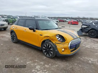 2016 MINI Cooper Hardtop 4 Door S with VIN WMWXU3C58G2B63277, listed as a IAAI auction lot 41566817 with 98,195 mi miles. Bid and sale history available at carsss.com. Image 1.