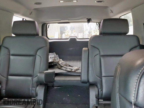 2020 Chevrolet Tahoe LT with VIN 1GNSCBKC5LR203301, listed as a Copart auction lot 57071315 with 106,376 mi miles and Salvage title. Bid and sale history available at DreamBid. Image 10.