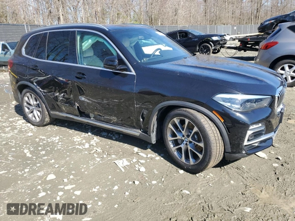 2019 BMW X5 xDrive40i with VIN 5UXCR6C50KLL51312, listed as a Copart auction lot 49631235 with Not provided miles and Salvage title. Bid and sale history available at DreamBid. Image 4.