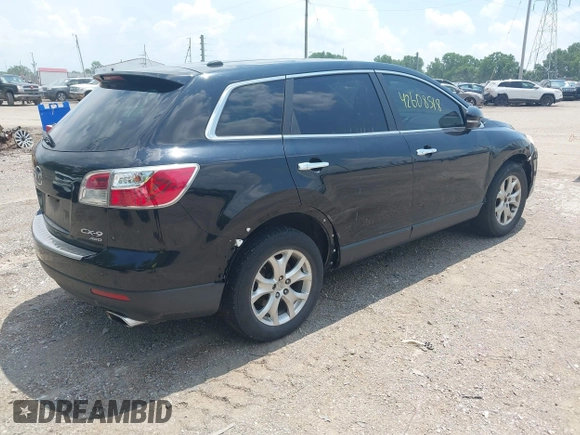 2012 Mazda CX-9 Grand Touring with VIN JM3TB3DA7C0348806, listed as a IAAI auction lot 42608518 with 229,337 mi miles and . Bid and sale history available at DreamBid. Image 4.