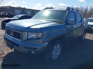 2007 Honda Ridgeline RTL w/Leather with VIN 2HJYK16547H527191, listed as a IAAI auction lot 42056127 with 126,715 mi miles. Bid and sale history available at carsss.com. Image 2.