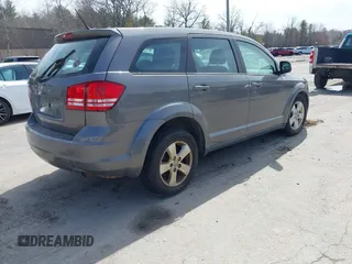 2013 Dodge Journey SE Plus with VIN 3C4PDCAB9DT582144, listed as a IAAI auction lot 41964828 with 171,398 mi miles and . Bid and sale history available at DreamBid. Image 4.