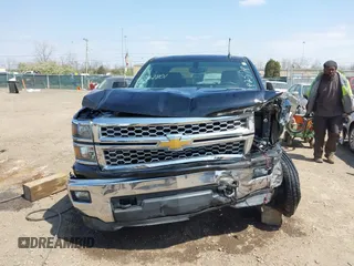 2014 Chevrolet Silverado 1500 LT with VIN 1GCVKREH9EZ282578, listed as a IAAI auction lot 42062801 with 163,158 mi miles and . Bid and sale history available at DreamBid. Image 12.