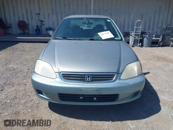 1999 Honda Civic LX z VIN 2HGEJ667XXH575496, wystawiony jako IAAI lot #42372107 z przebiegiem 175 154 mil mil oraz . Historia ofert i sprzedaży dostępna na DreamBid. Obrazek 6.